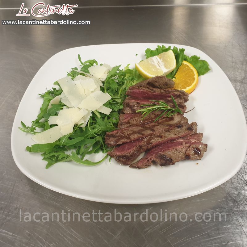 Tagliata di Scottona “Manzo” con Rucola e Grana